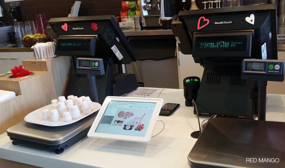 Lắp đặt thiết bị bảo vệ máy tính bảng tại  cửa hàng Red Mango